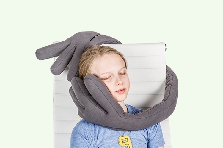 This travel pillow is a giant pair of hands that can help you sleep